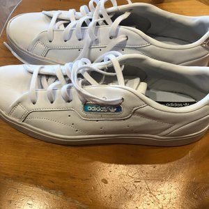 White Adidas sleek tennis shoes